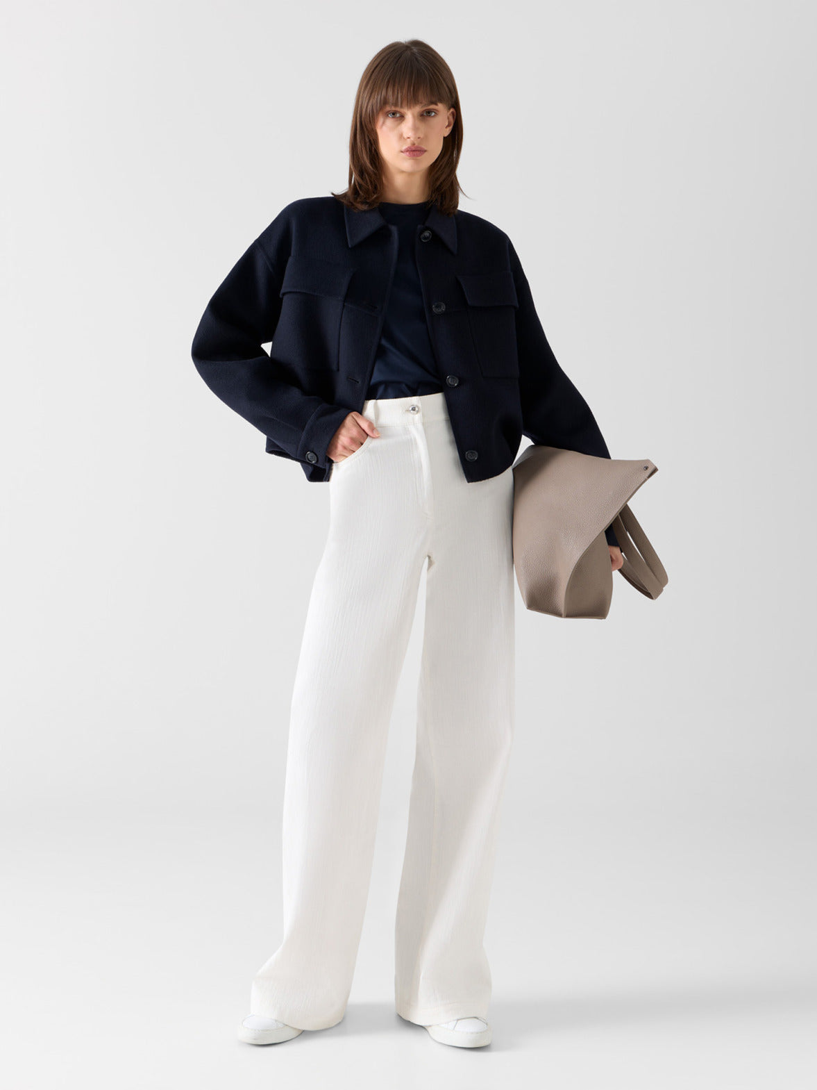 Akris women's pants featuring refined tailoring, modern silhouettes, and timeless elegance for versatile luxury dressing.