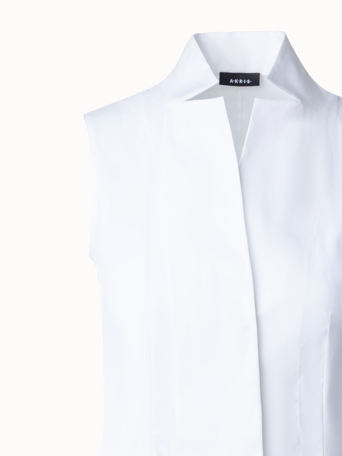 Ladies White Sleeveless Blouse - Manufacturer Exporter Supplier