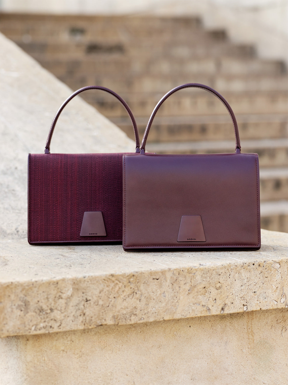 Akris Alice Bag in burgundy crafted from leather and horsehair with clean lines, luxurious materials and timeless elegance.