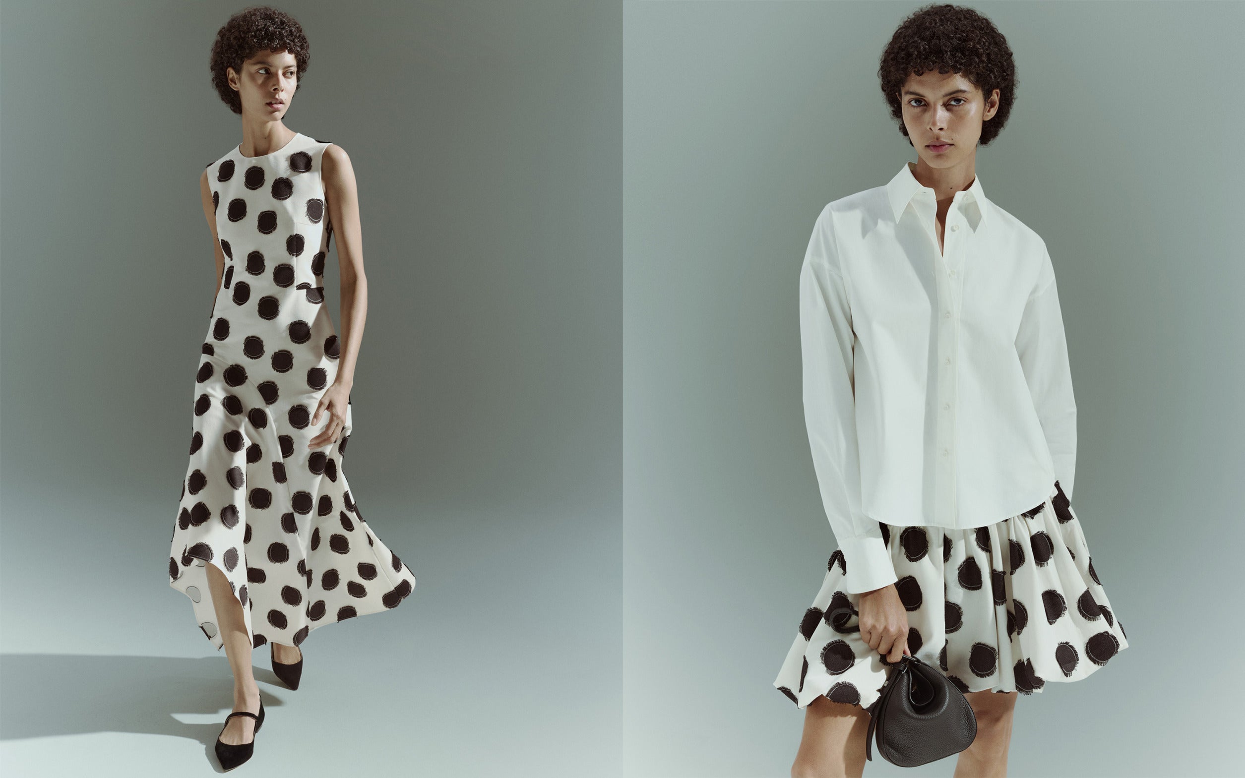 Akris punto Pre-Fall 2026 collection luxury women's apparel.
Features a sleeveless white midi dress with large black polka dots.
Styled next to a classic long-sleeve white button-up cotton shirt.