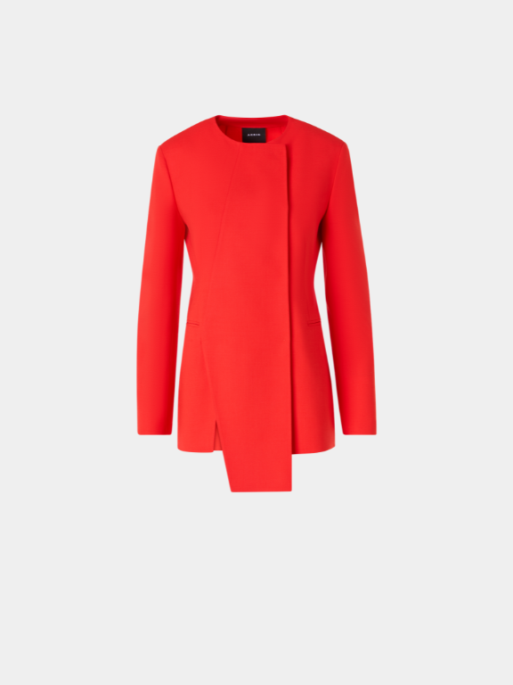 Sophisticated vibrant red collarless blazer with a sleek, minimalist sculptured design and concealed closure. Features a dramatic asymmetrical front panel drape that adds an avant-garde touch to a classic silhouette. Tailored finish with clean lines and subtle welt pockets, perfect for a high-impact, professional aesthetic.