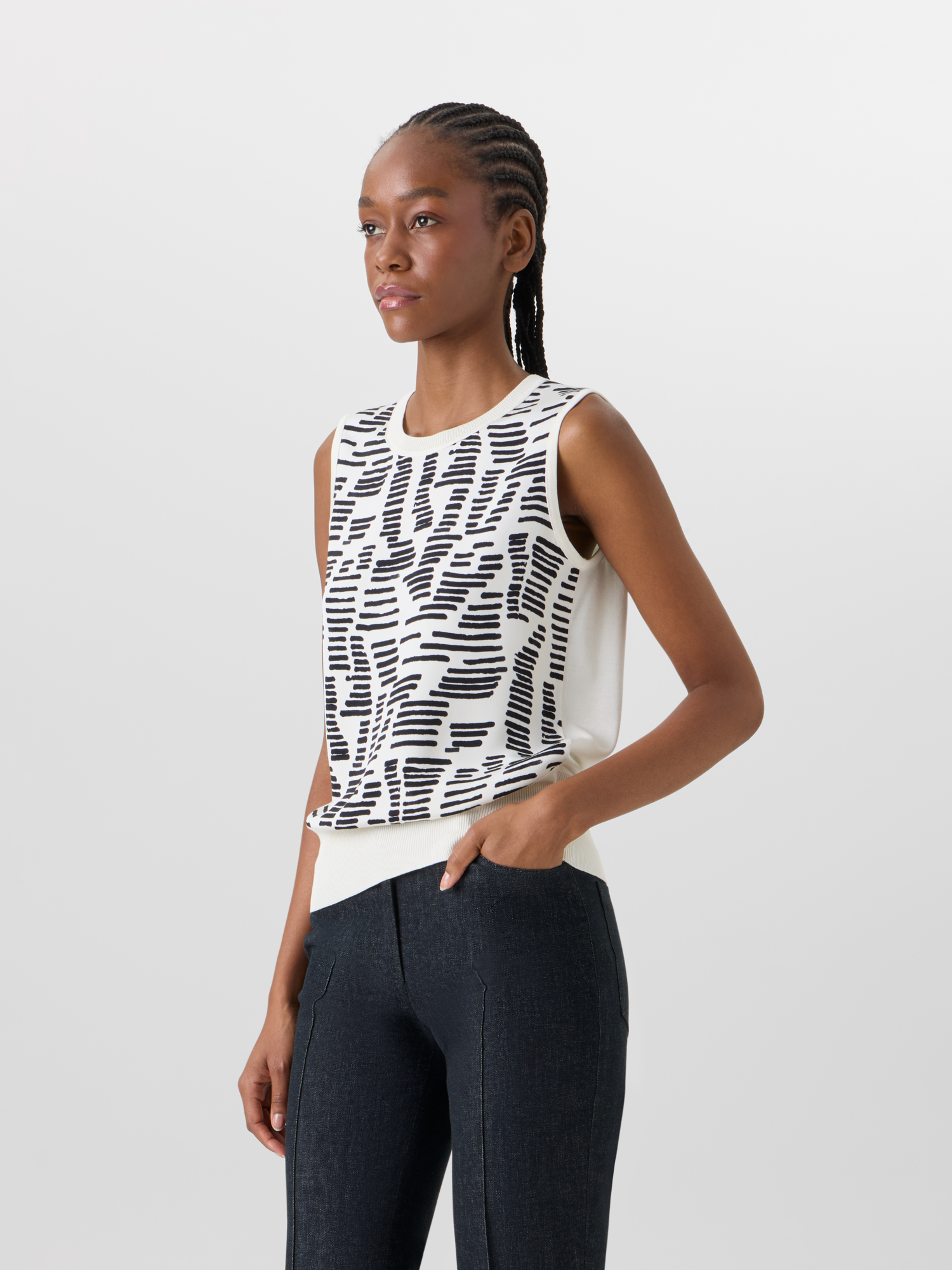 Designer Sleeveless Dance Movement Knit Top - ecru 
